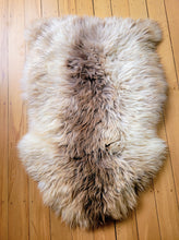 Load image into Gallery viewer, Naturally beautiful - undyed sheepskin rug. shades of ivory/golden brown 95cm
