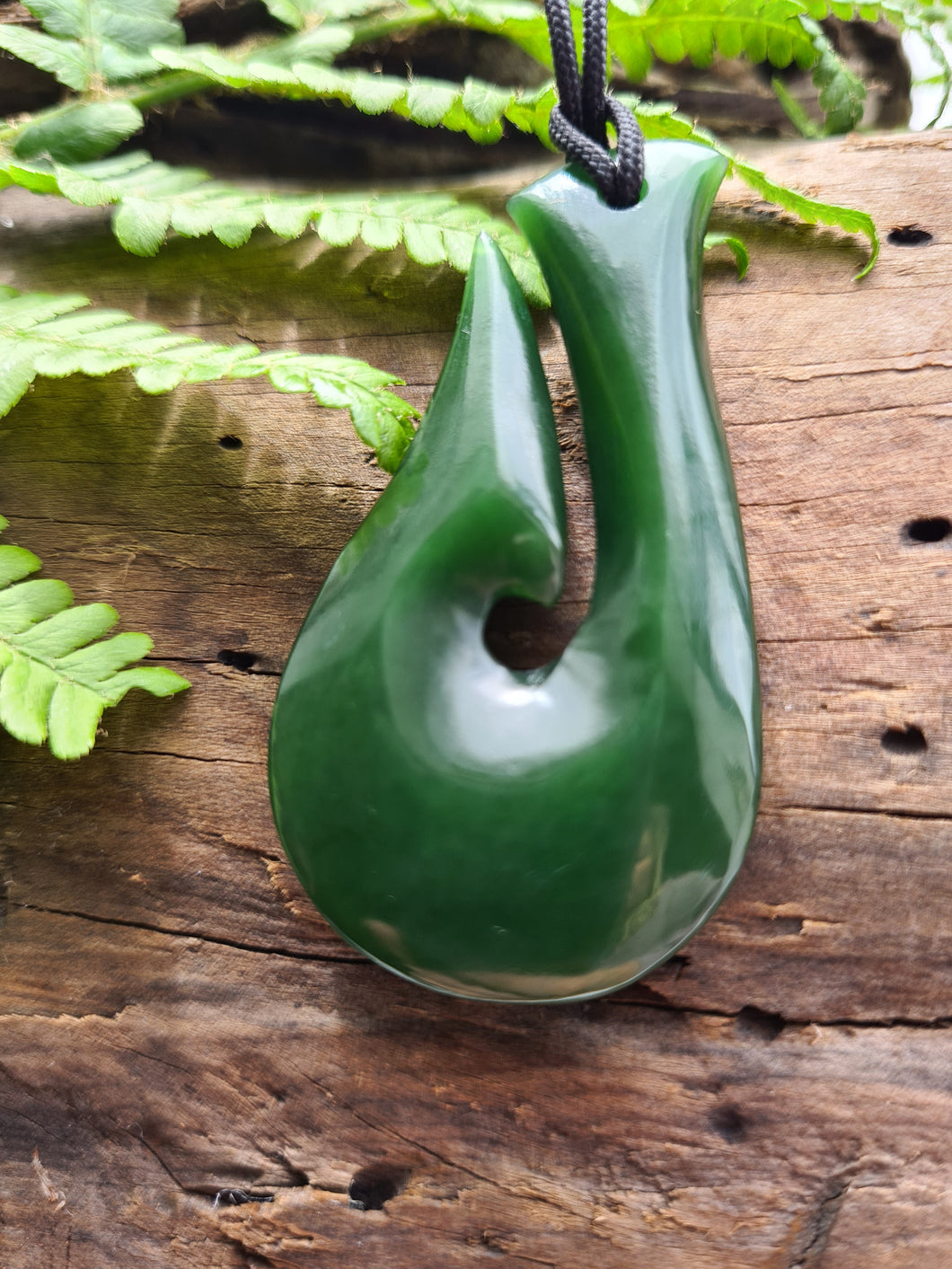 Hei Matau - Hook - Hand carved NZ greenstone. Symbolises good luck and safe travel across water